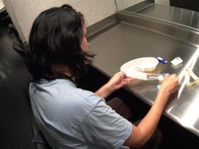 A client prepares to fix at Vancouver's Insite safe injection site. (Image: Insite)