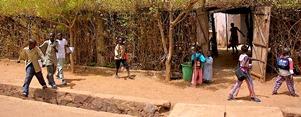 children walking from home to school in Bamako, Mali (JoeyTranchinaPhotographyÂ©2014 SÃ¨te, France)